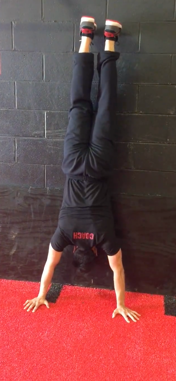 Performing a Handstand Pushup